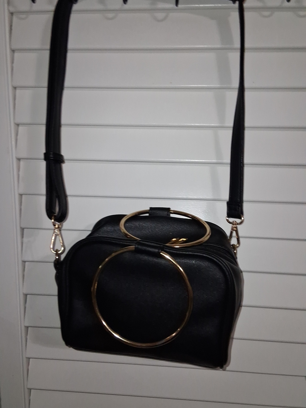 Olivia Miller Black Crossbody Bag with Gold Ring Accents